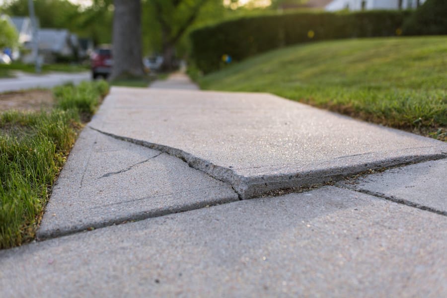 Concrete repair necessary on sidewalk