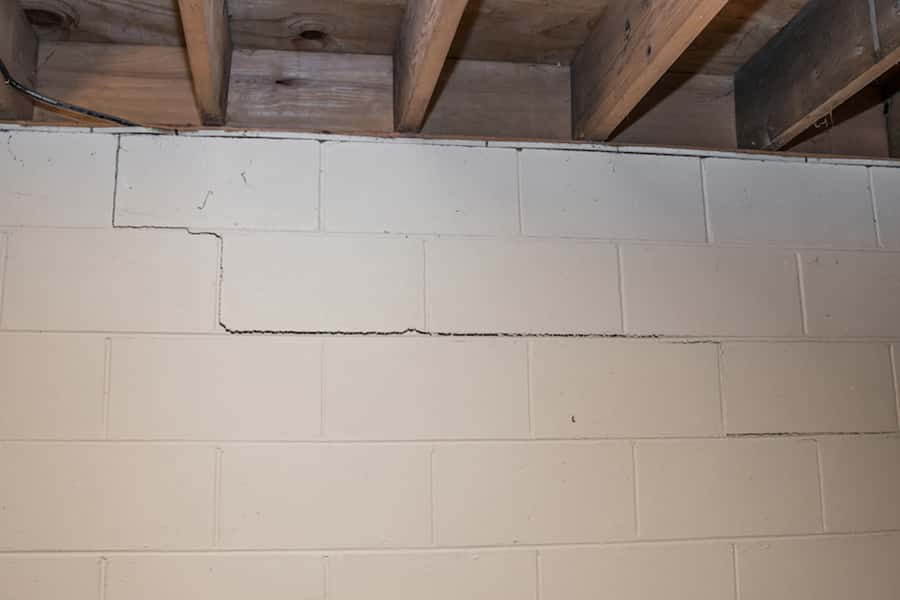 Stair step crack in basement cement block wall