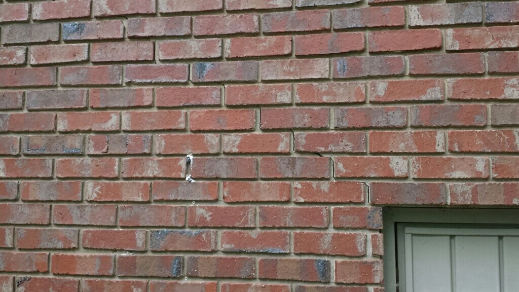 Foundation settlement repair on a brick house