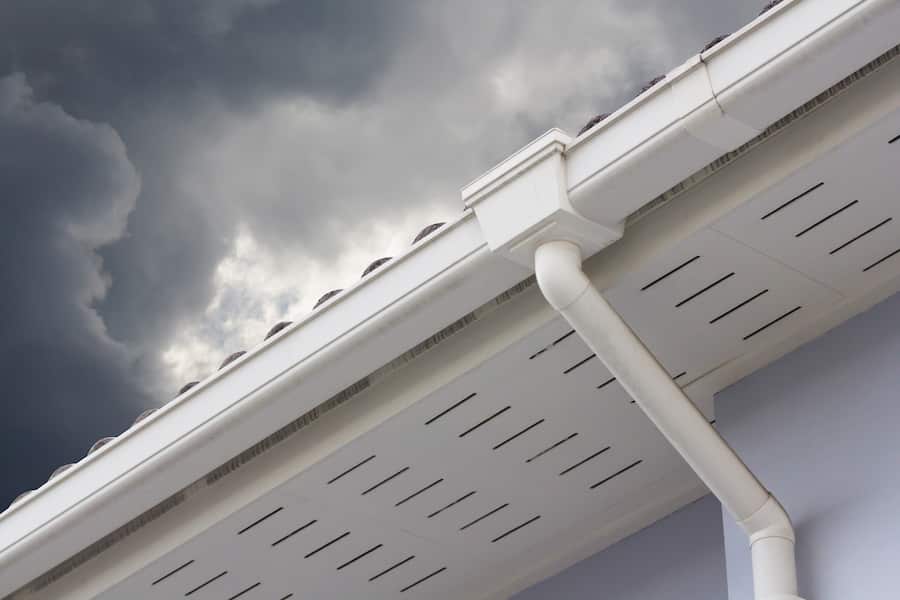 Gutters on home in front of gray sky